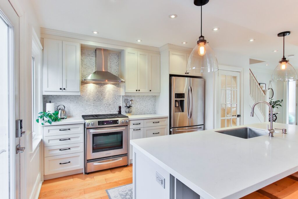 Bright, white kitchen with an island