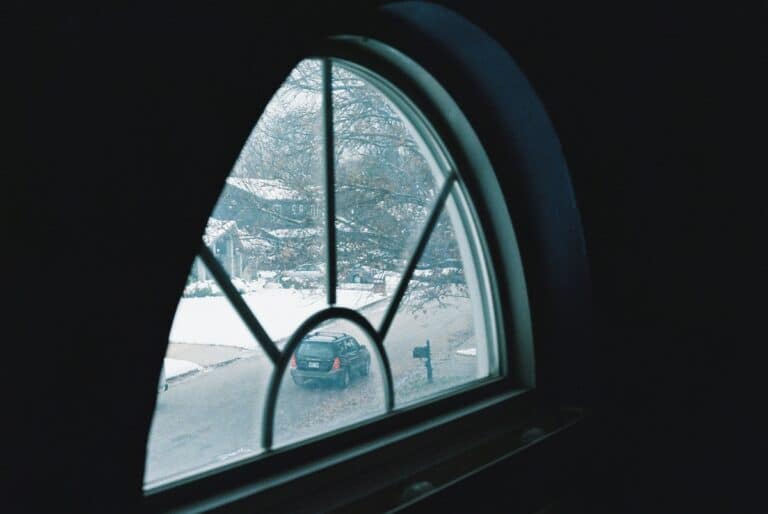 custom window over door facing street in winter